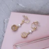 圓粉珍珠×蚊香盤U型耳夾-第3張