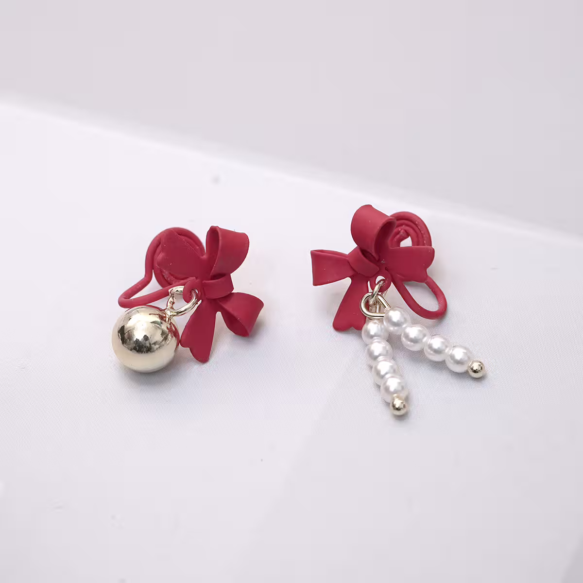 蝴蝶結鈴鐺珍珠串&times;不對稱蚊香盤U型耳夾-第2張