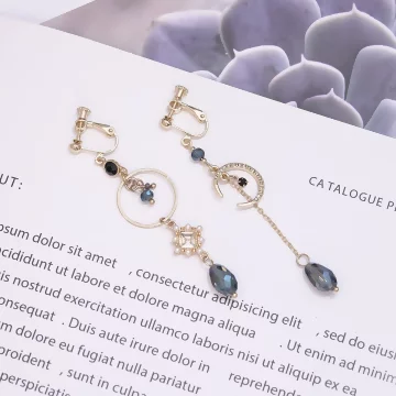 藍晶輕奢月亮×不對稱螺旋耳夾.avif