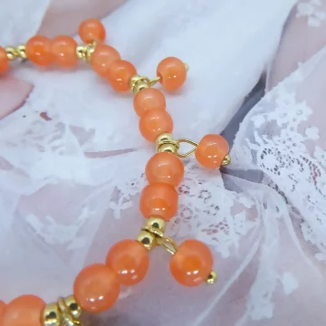結果的橙色四葉草×固定式串珠手鍊.avif