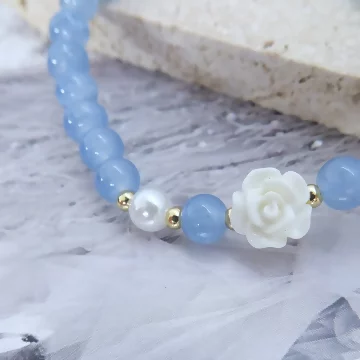 海藍寶典雅山茶花×固定式串珠手鍊.avif