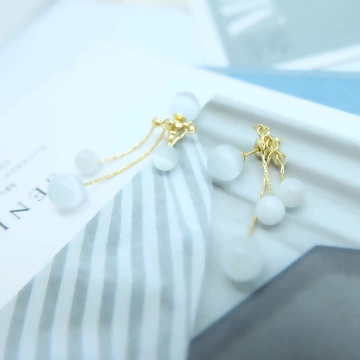 貓眼石撞珠×後掛式吊墜耳環.avif
