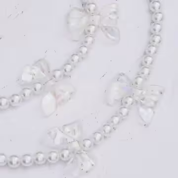 透明蝴蝶結×白色珍珠×手機斜背雙勾掛繩