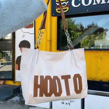 HOOTO字母皮革包×肩背包×白底咖字.avif