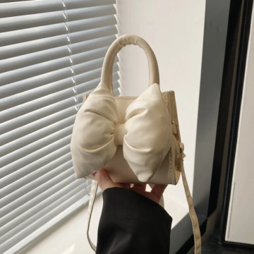 澎澎蝴蝶結小廢包×斜背包×白色.avif