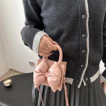 澎澎蝴蝶結小廢包×斜背包×粉紅.avif