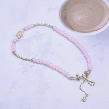 細串粉水晶愛心×固定式串珠手鍊.avif