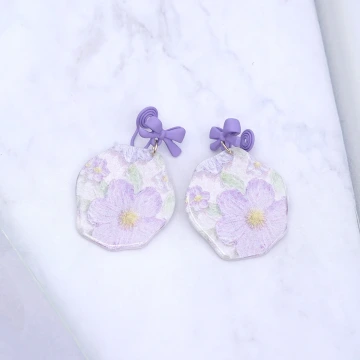 紫花蝴蝶結&times;吊墜耳環.avif